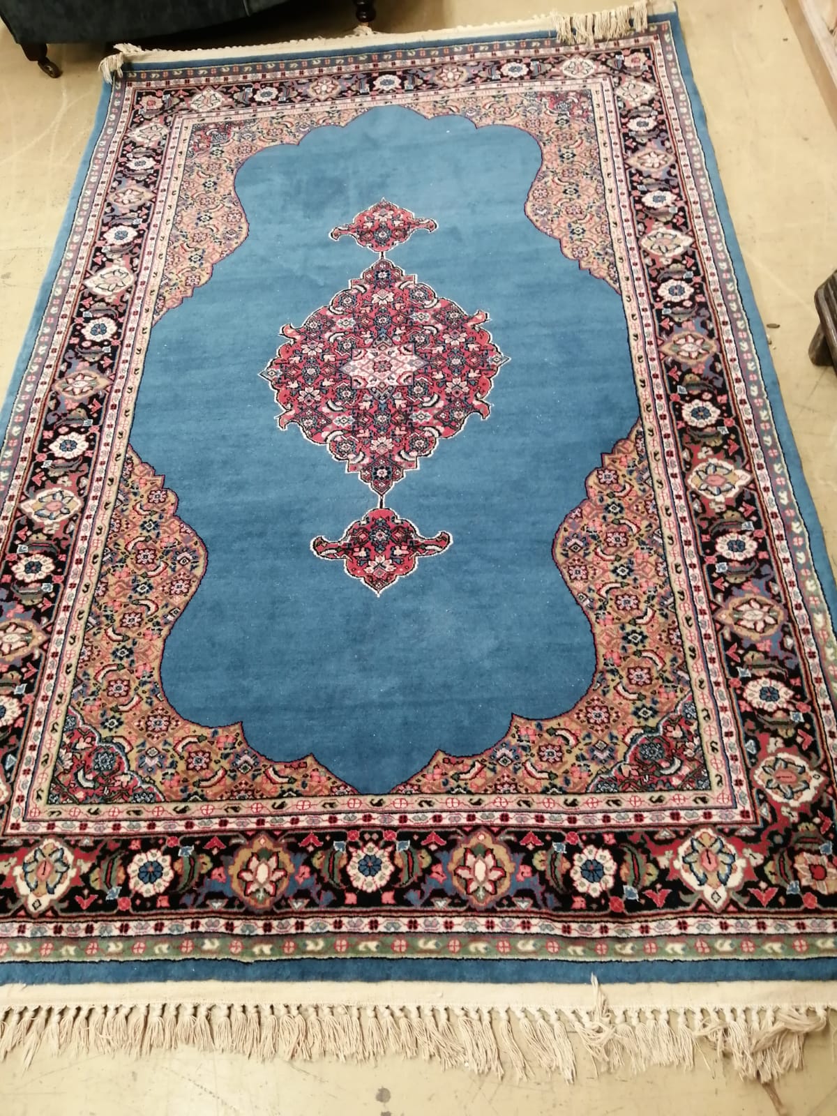 A North West Persian style blue ground rug, 206 x 137cm